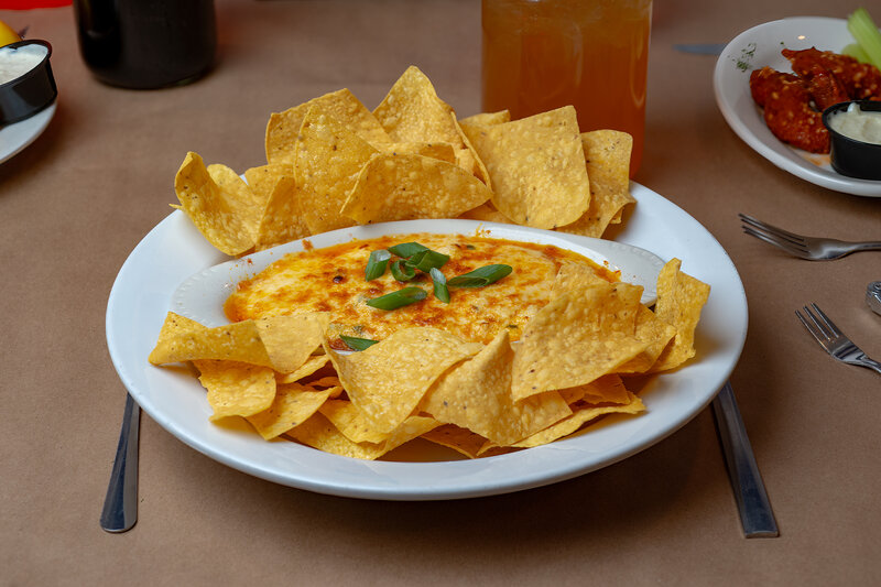Nachos with queso cheese appetizer
